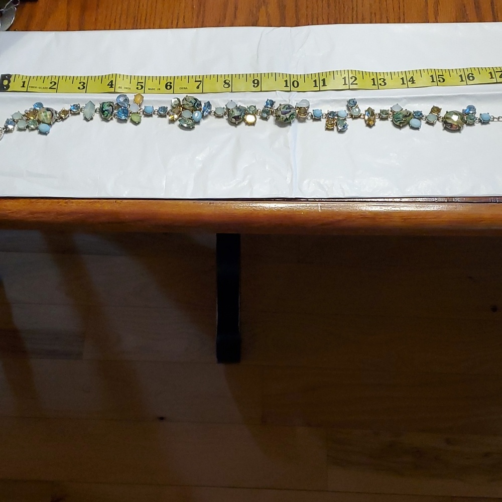 Multi-stone necklace by designer Natasha. Never worn. 17 in long with claw clasp